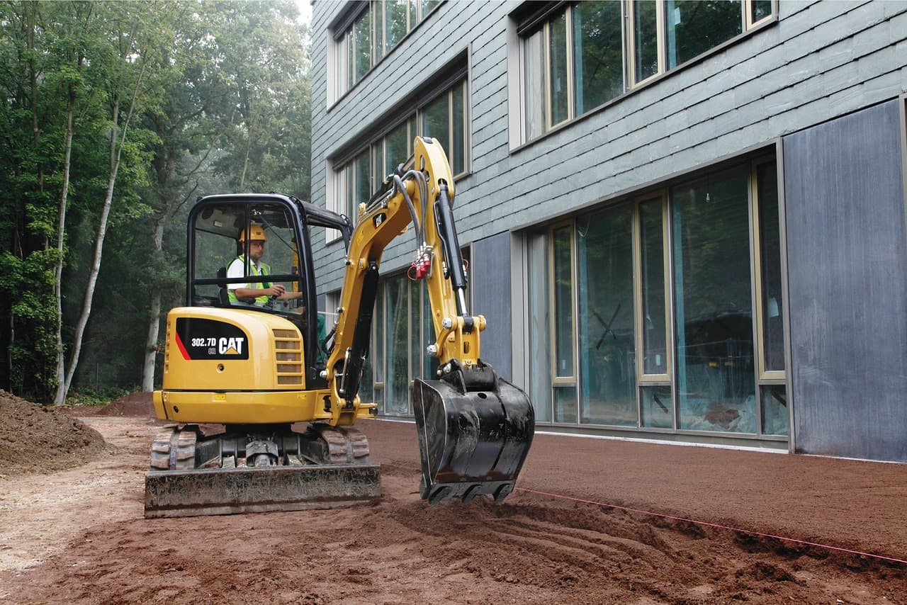 Mini excavator working on a residential groundworks site