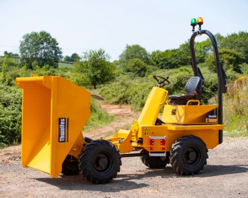 Yellow Thwaites 2-tonne front tip dumper on a site track